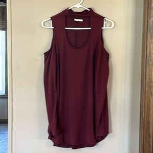 Maurices Women’s Brick red and black cold shoulder thin knit top. Size large?